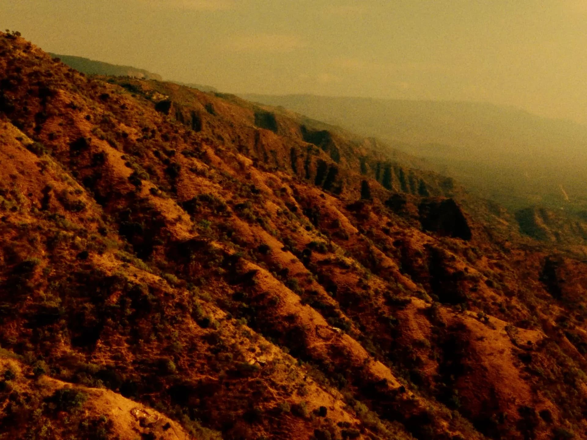 Mountain valley landscape with rocky peaks and wilderness, Milimani trail scenery