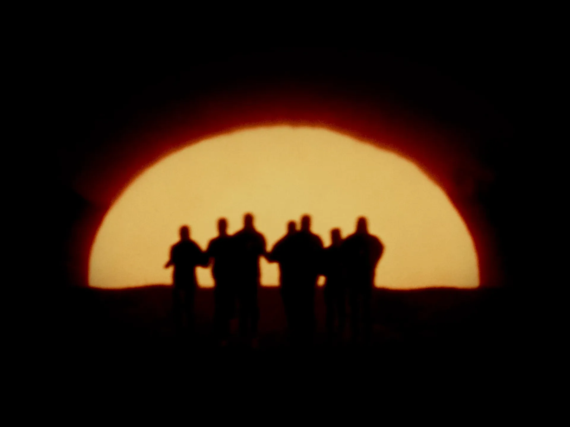 Person silhouetted against sunset sky in nature, Milimani outdoor photography