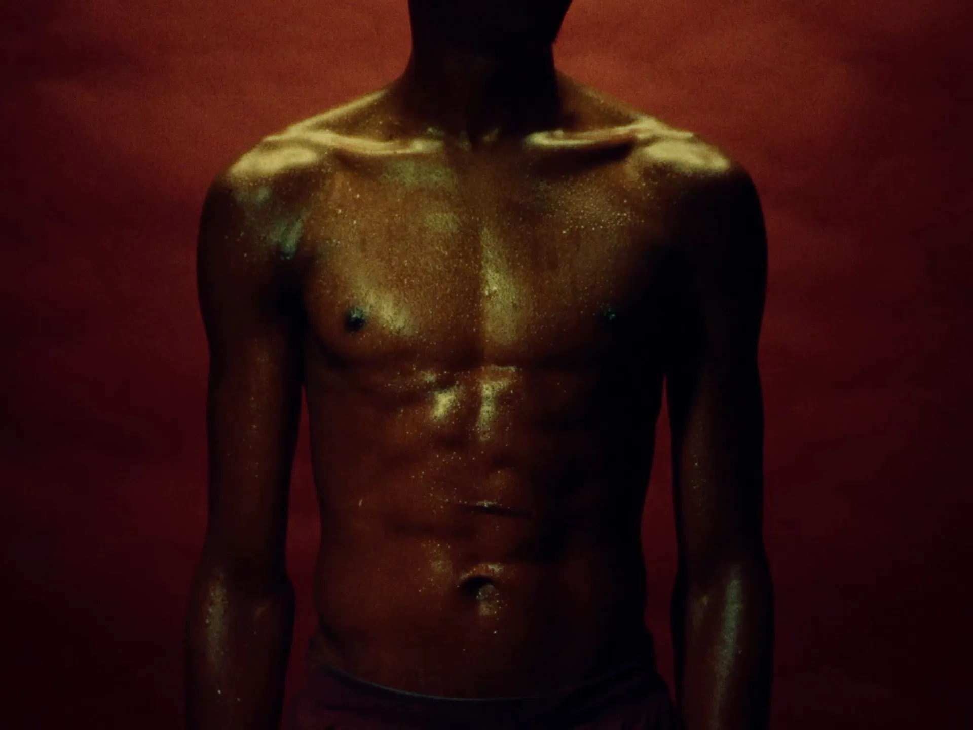 Man sweating during intense trail running effort, Milimani endurance photography