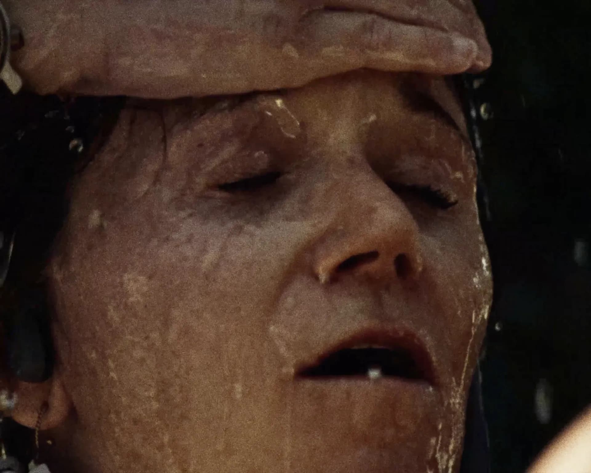 Runner's emotional face close-up during Western States ultramarathon effort