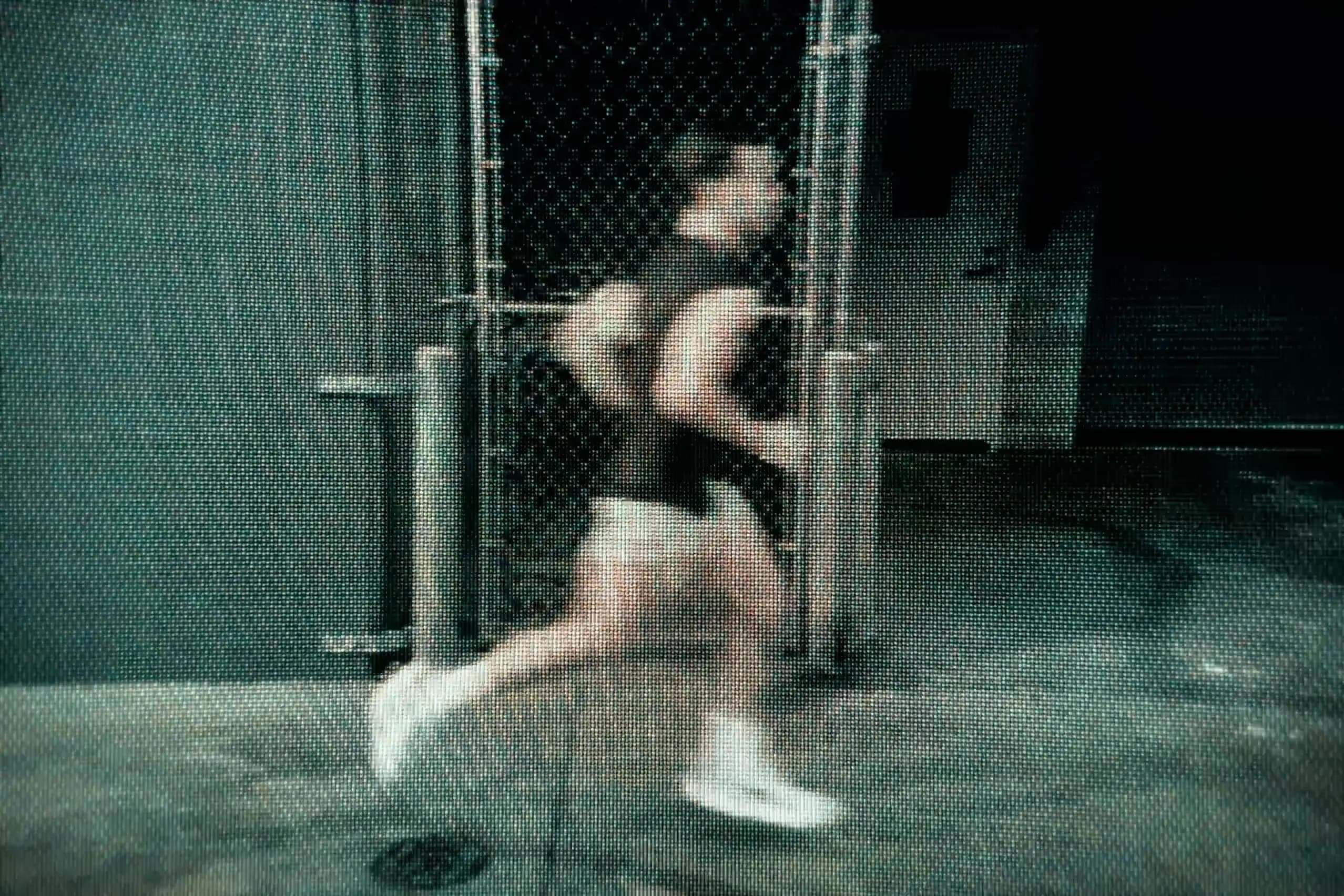 Person wearing Puma shorts posing indoors for a sportswear editorial