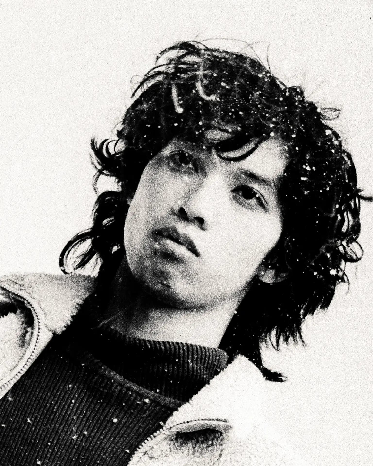 Portrait of a man outdoors wearing Auclair gear, close-up photography