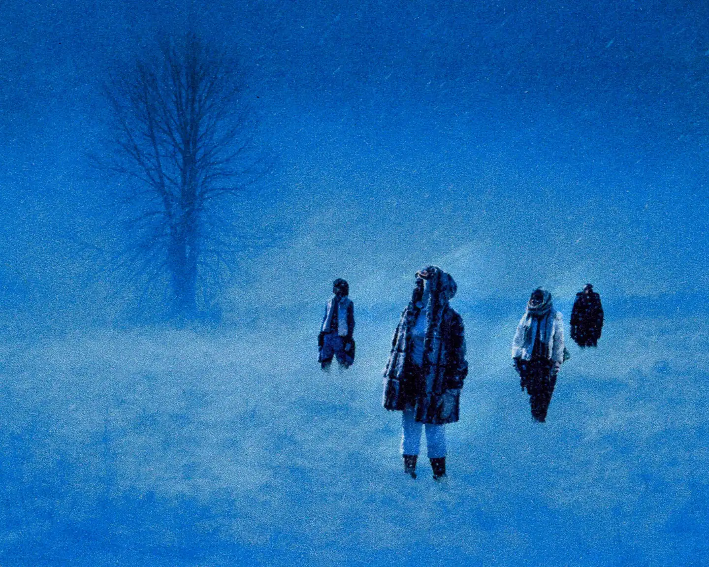 Person hiking outdoors with backpack and helmet wearing Auclair coat and shoes