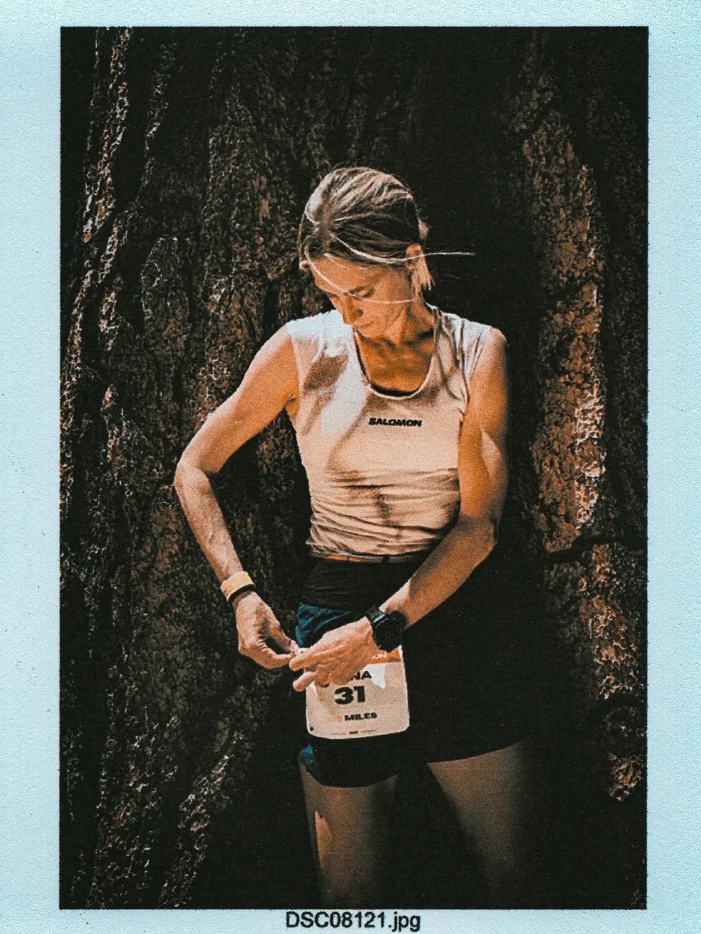 Man in shorts and undershirt with wristwatch, Western States runner portrait