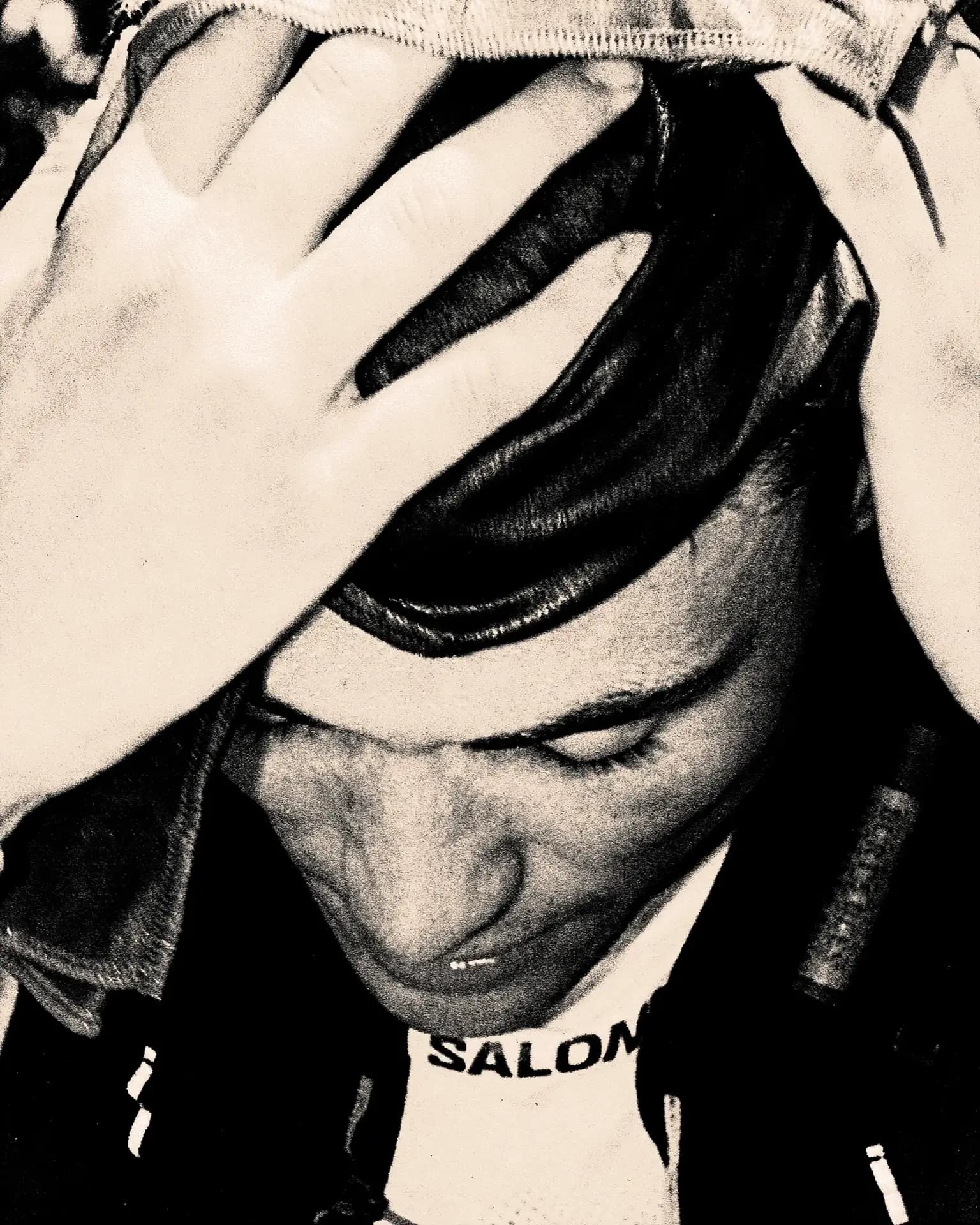Person wearing baseball cap in close-up portrait, Western States race photography