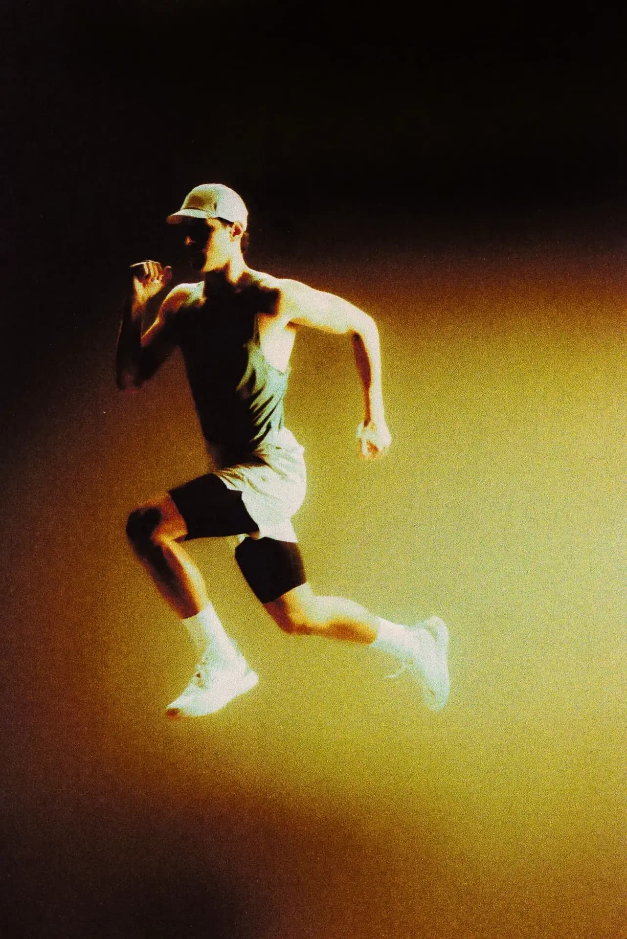 Person in Ciele Le baseball cap, shorts and sneakers dancing outdoors